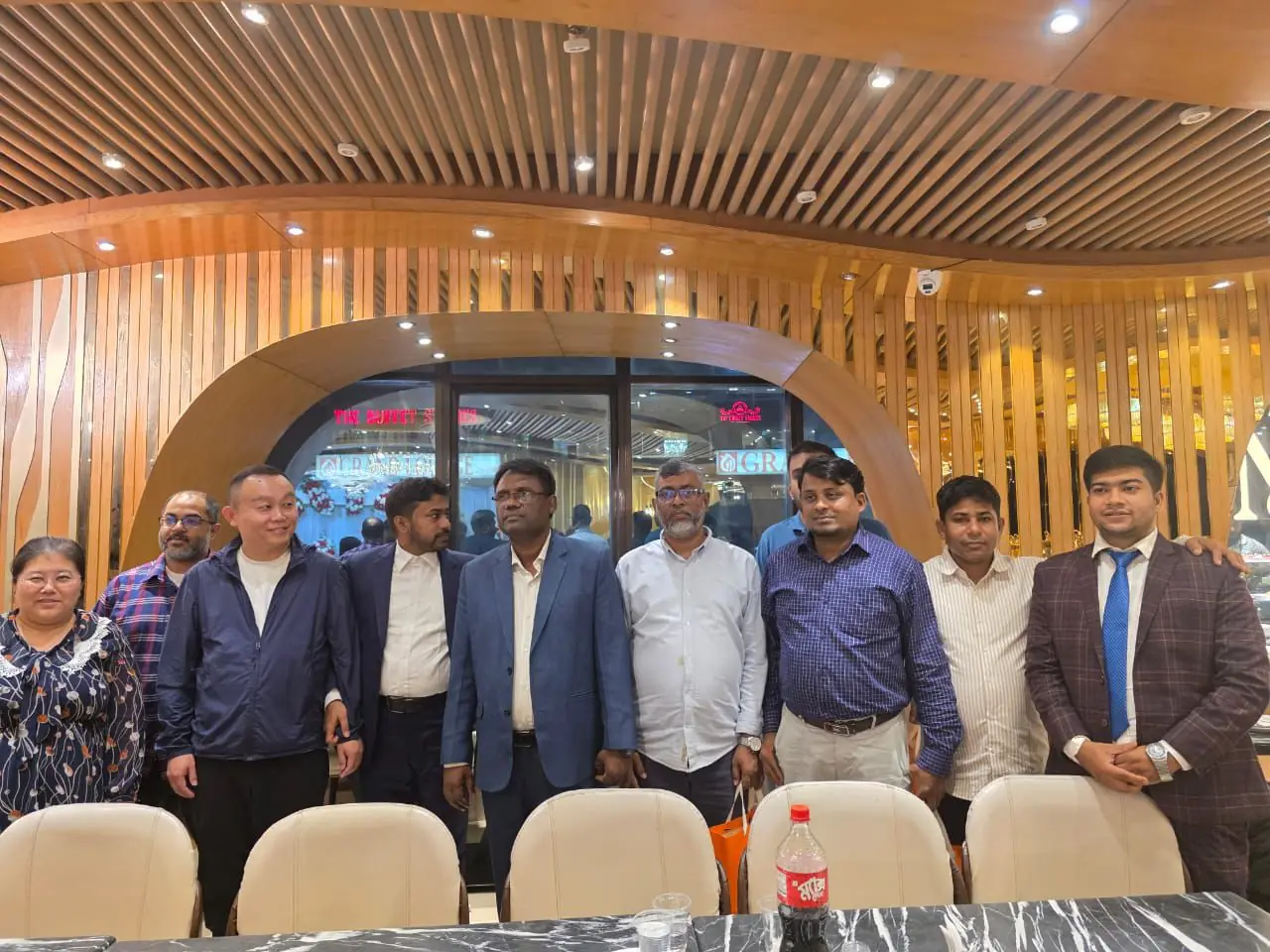 R.S. Agro team members with partners at a business dinner in Dhaka